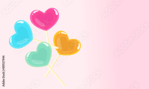  Cute heart lollipop candy on a pink background