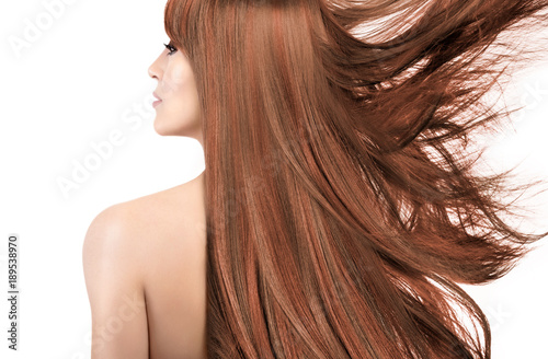 Beauty model with gorgeous long hair with highlights. Coloring techniques