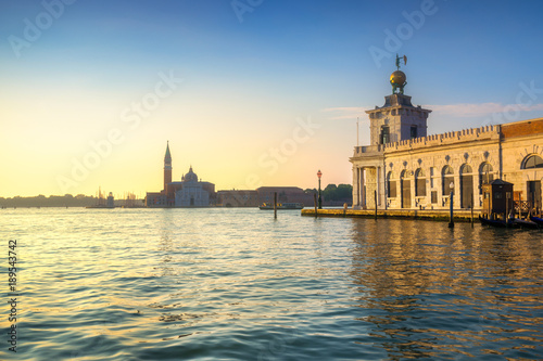 Venice lagoon, San Giorgio church and Punta della Dogana at sunrise. Italy