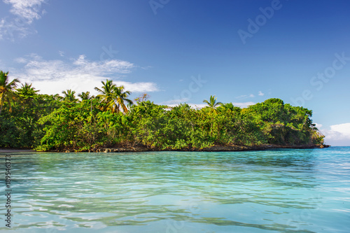 Caribbean scenic landscape, tropical green island in the blue sea