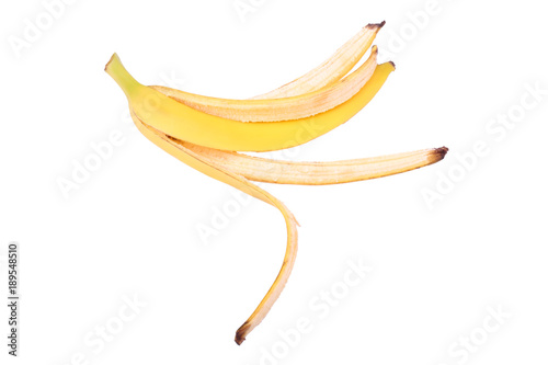 yellow banana peel on a white background