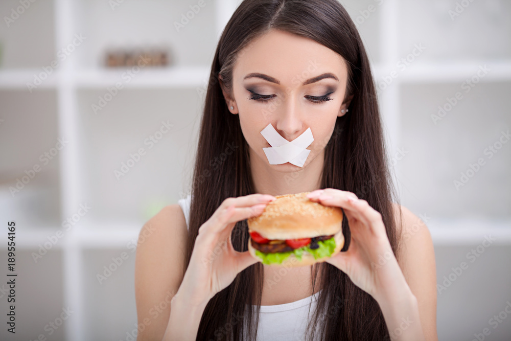 Diet. Woman refuses to eat junk food . Healthy eating and active lifestyle concept Diet. Woman refuses to eat junk food . Healthy eating and active lifestyle concept