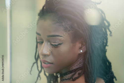 Valokuva Charming African girl with dreadlocks