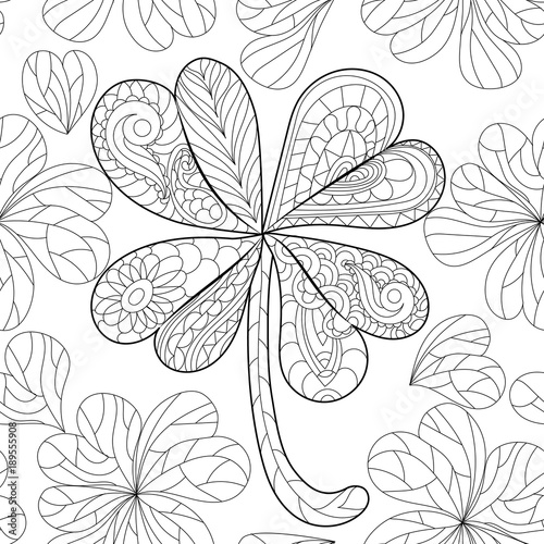 Coloring book clover, shamrock on St. Patrick's Day for adults. Isolated pattern. Hand drawn vector sign luck. Anti stress seamless ethnic bohemian background. Vintage decorative element.Indian motifs photo