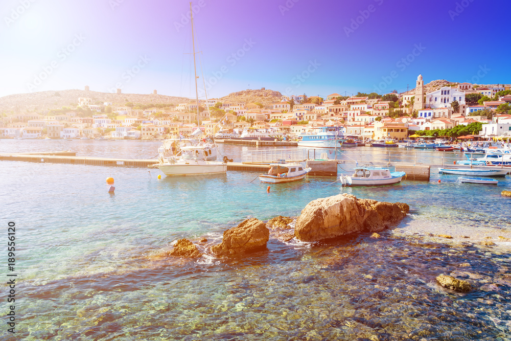 Fototapeta premium Boats in port of town Emporio (Nimborio) - capital of island of Halki (GREECE)