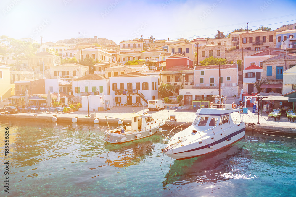 Boats in port of town Emporio (Nimborio)  - capital of island of Halki (GREECE)