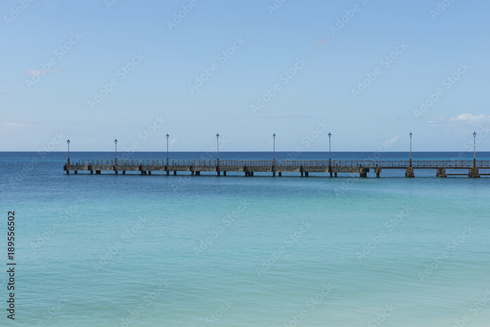 Empty Pier in the Calm Blue Sea