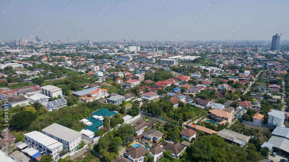 Fototapeta premium Aerial city view from flying drone at Nonthaburi, Thailand. top view of the city