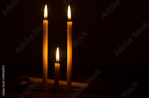 Several designs of candle light on dark background