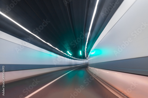 Motion blur of car moving inside tunnel