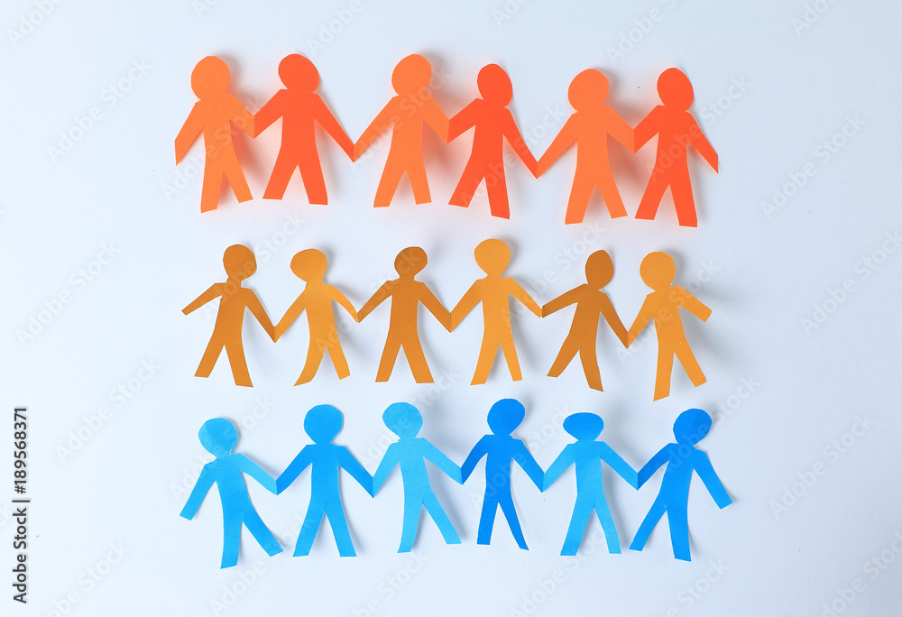 three teams paper men taking each other's hands three teams paper men taking each other's hands