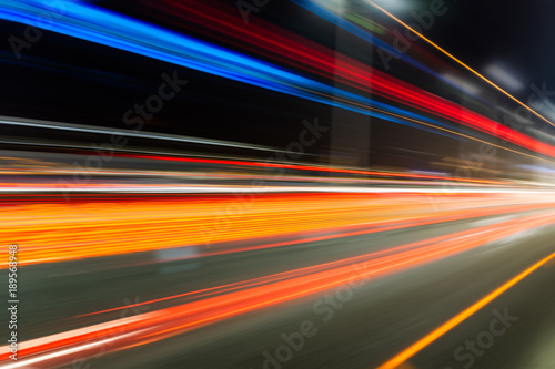 Vehicle light trails in city at night.