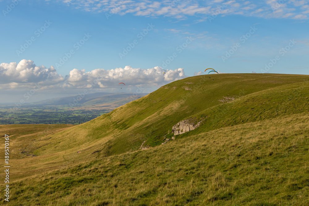 Paragliding near the Nine Standards Rigg near Kirkby Stephen, Yorkshire Dales, Cumbria, UK