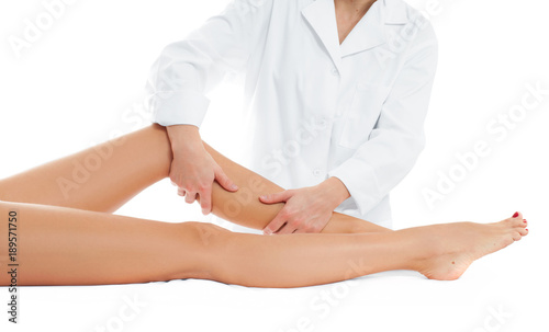 Beautiful woman having massage leg at spa salon