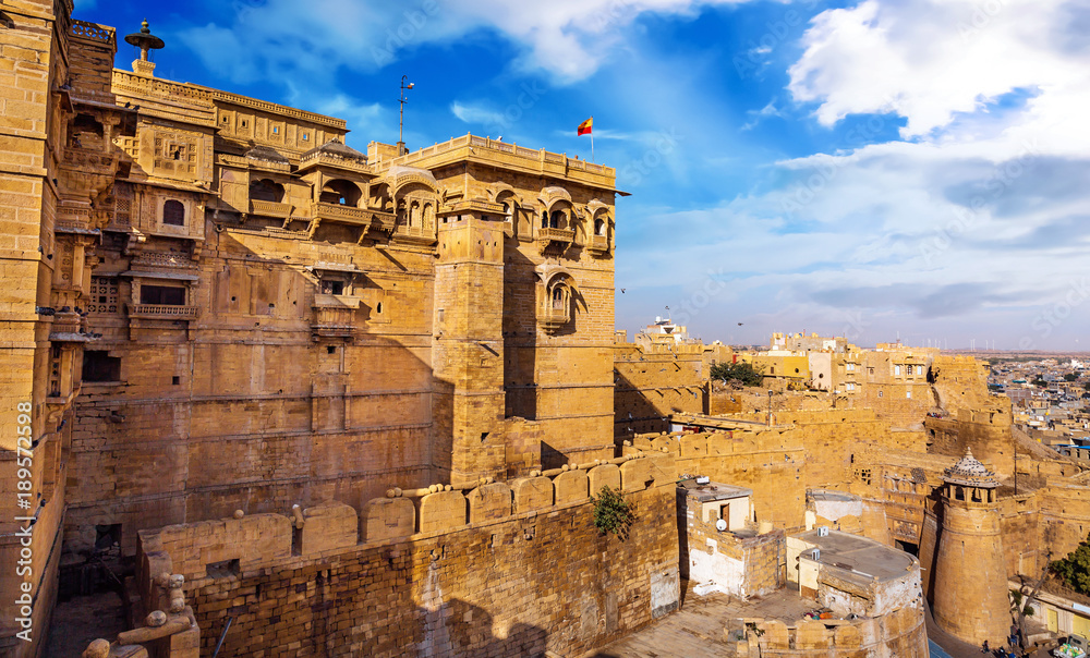 Jaisalmer Fort known as the Golden Fort made of yellow limestone with view of city scape. Jaisalmer Fort is a UNESCO World Heritage site.
