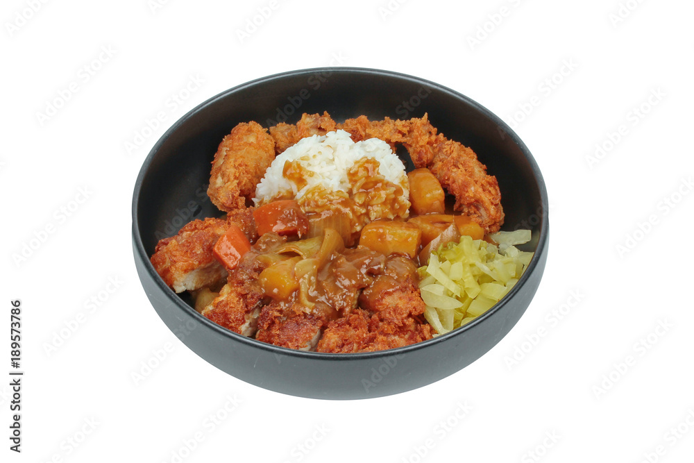 Rice with deep fried chicken,sliced picklesl topped Japanese yellow curry . Rice with deep fried chicken,sliced picklesl topped Japanese yellow curry .