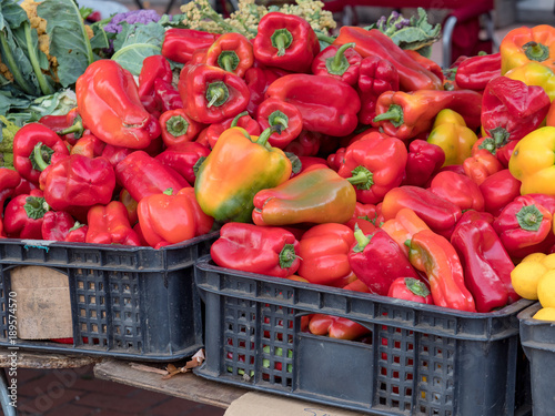 Fototapeta Naklejka Na Ścianę i Meble -  Red peppers on sale aon stand at farmer's market