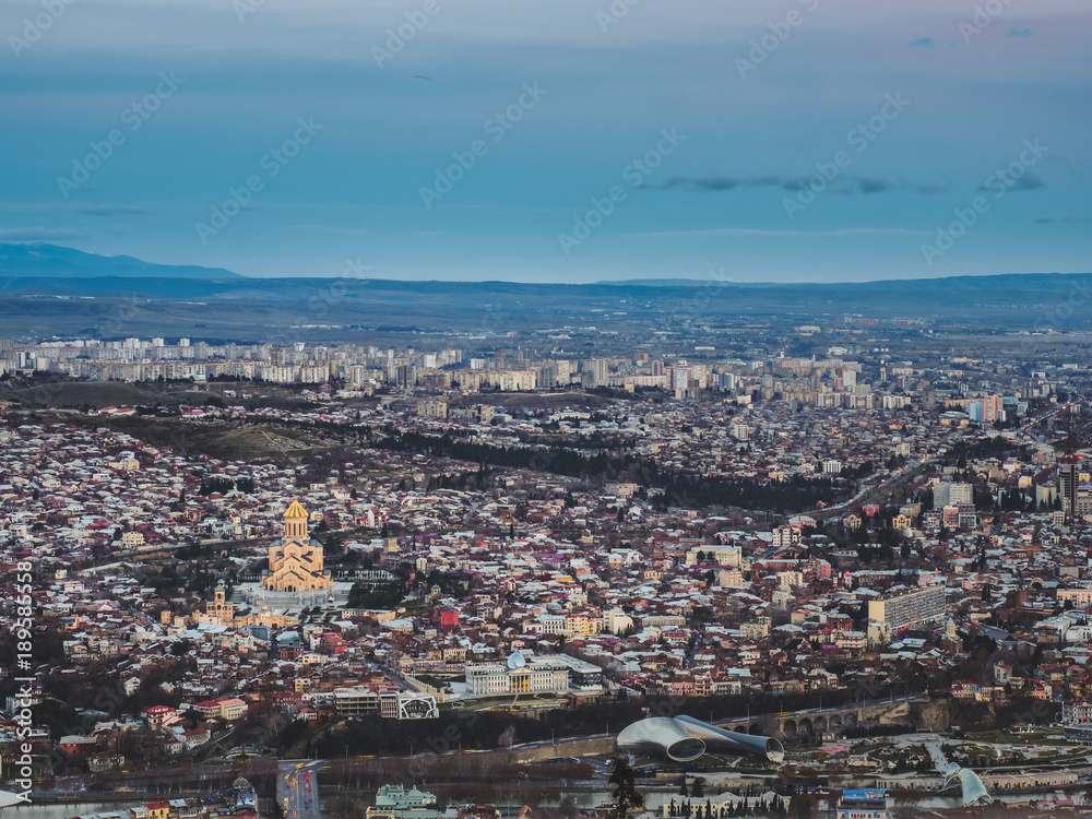 aerial view of city in Georgia and sky at sunset