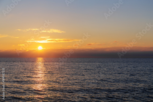 sunset over the sea © Maslov Dmitry