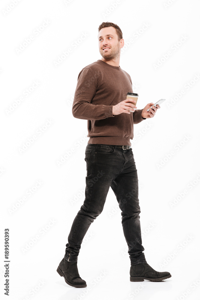 Happy young man walking isolated Happy young man walking isolated
