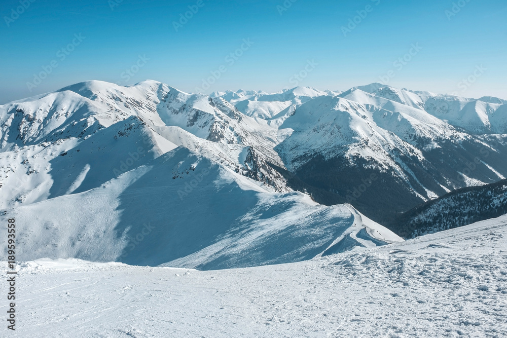 Fototapeta premium Nice mountains view at sunny day with blue sky with sun light at