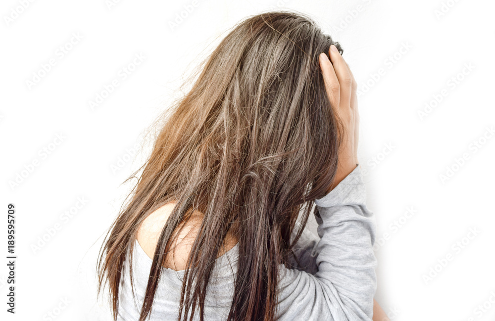 Women depression and holding her head in her hands Women depression and holding her head in her hands