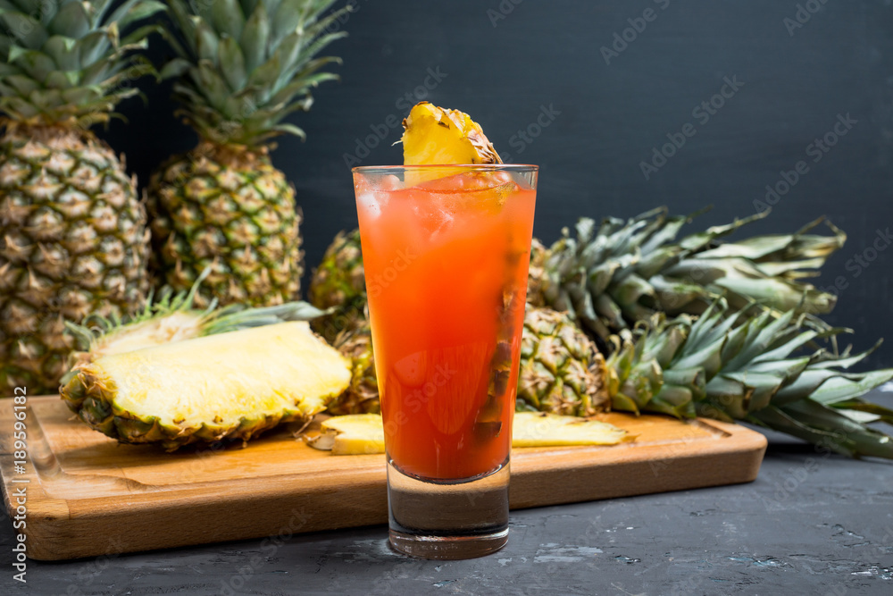 Sweet cocktail with pineapple and rum. Selective focus. Sweet cocktail with pineapple and rum. Selective focus.