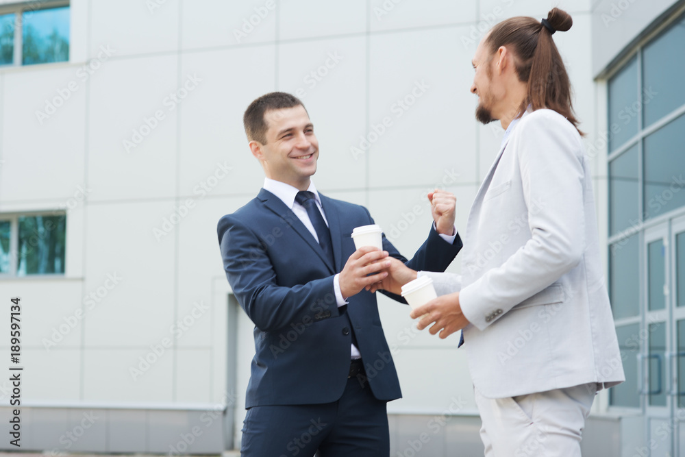 a businessman in a suit around the office a businessman in a suit around the office