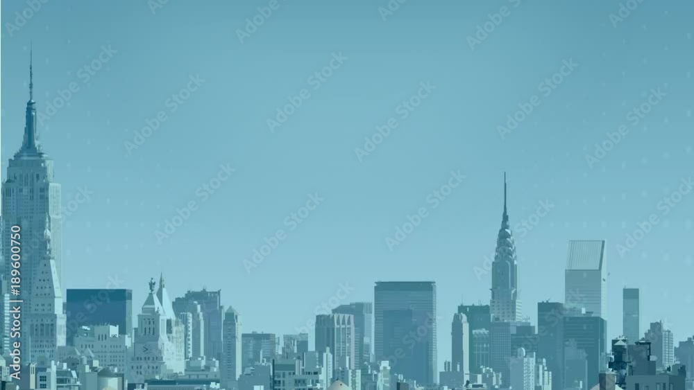 the city of new York. the buildings revolve around its axis.on the background of the city appear indexes,currencies,dollars,euros