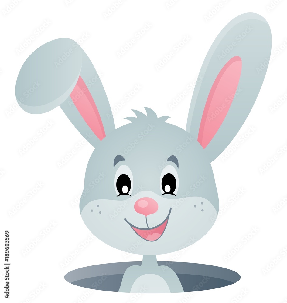 Obraz premium Rabbit lurking from hole image 1