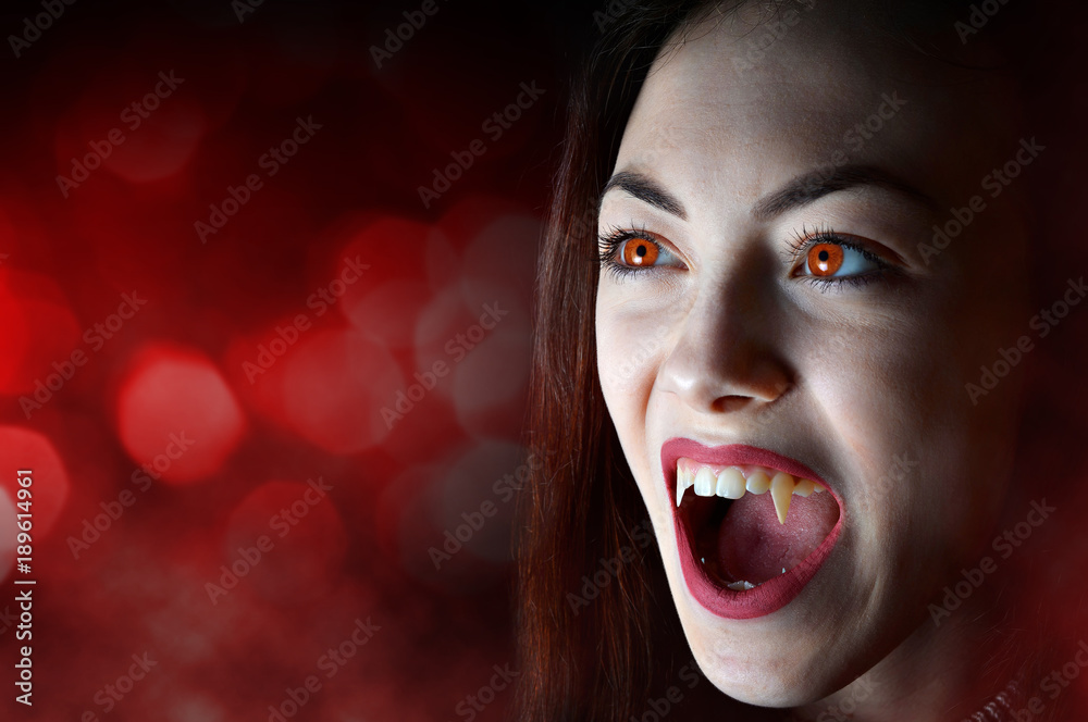 Fototapeta premium Halloween angry vampire woman. Horror theme.