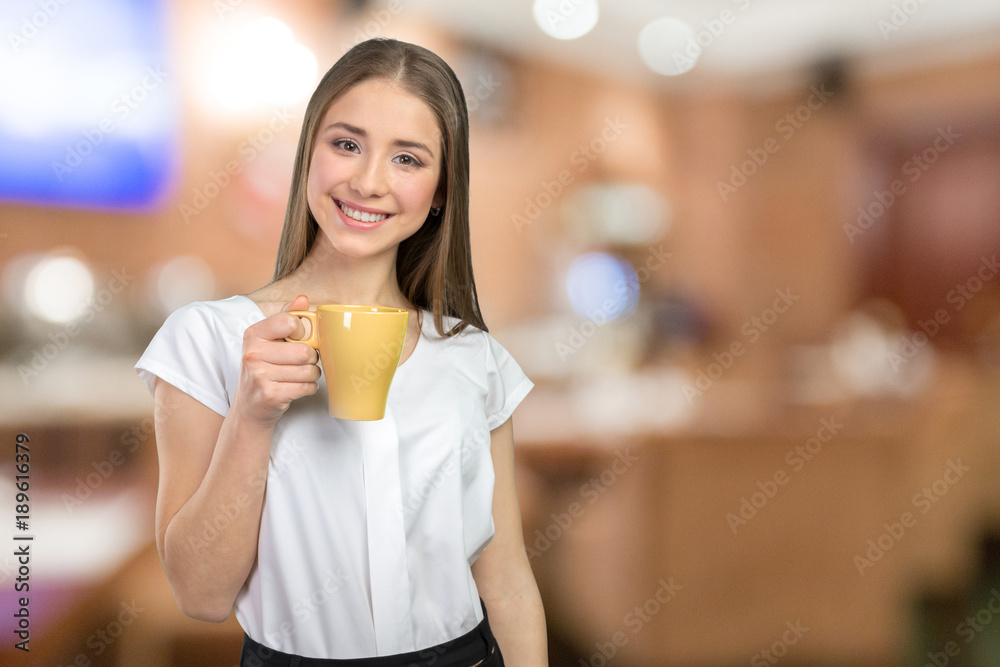 Business woman portrait with cup