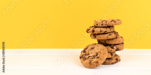 cookies with yellow background and copy space panorama