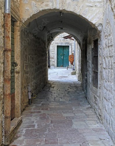 narrow arch passage in the old town of Kotor