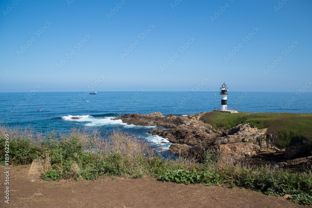 Lighthouse of Pancha Island in Ribadeo, Galicia, Spain. 