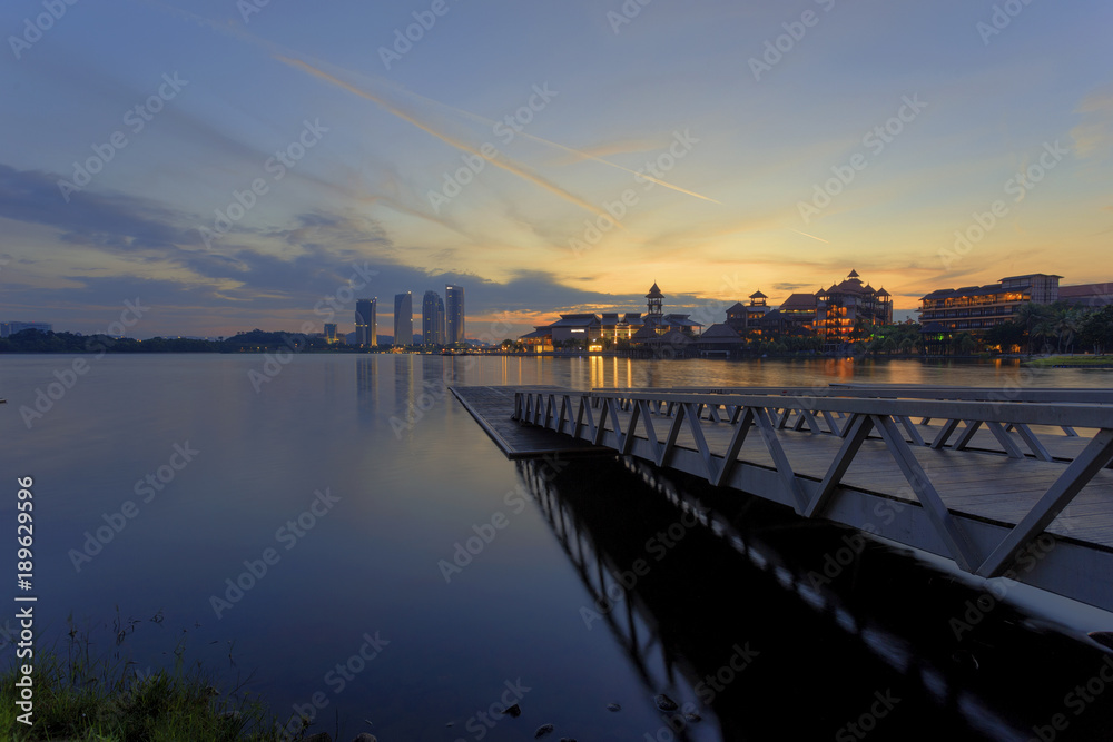Freshness and tranquility of the lake and city view at Putrajaya lakeside during sunrise