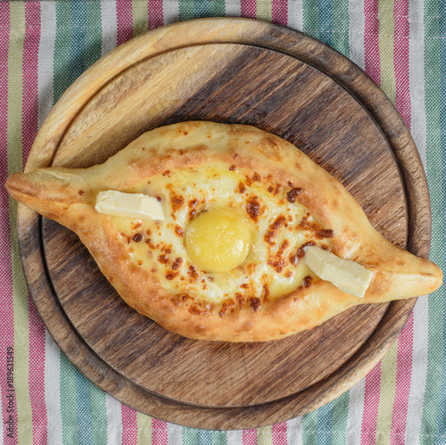 Traditional Georgian bread - khachapuri and Kolkh khachapuri on the table. Homemade baking. Top view.