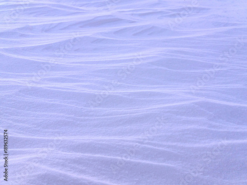 Wavy snow surface texture.