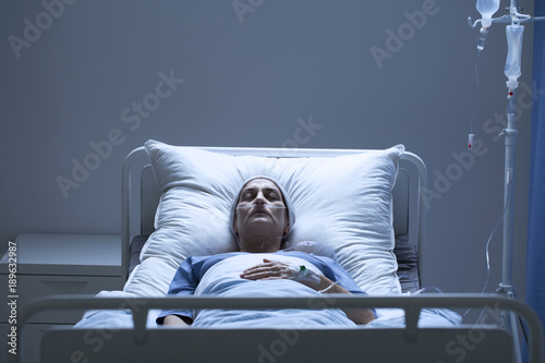 Weak woman during chemotherapy photo