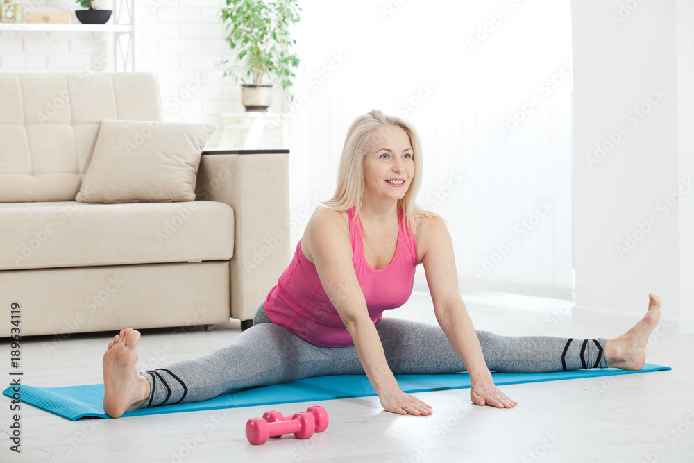 Middle-aged woman in her 50s stretching for exercise Middle-aged woman in her 50s stretching for exercise