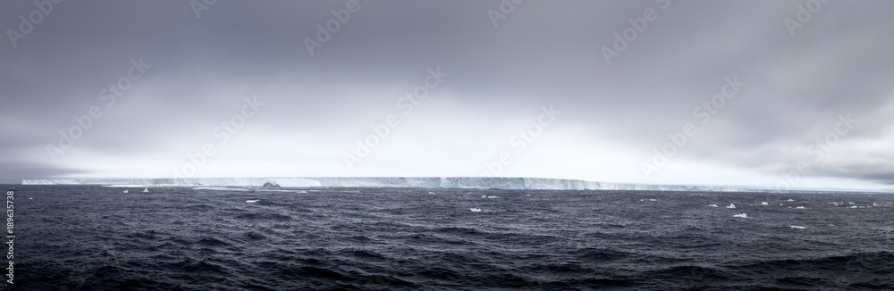 Panorama of Iceberg B-15 the largest iceberg in history with here the largest surviving fragment B-15T, which measures 52 kilometers (32 miles) long and 13 kilometers (8 miles) wide. Panorama of Iceberg B-15 the largest iceberg in history with here the largest surviving fragment B-15T, which measures 52 kilometers (32 miles) long and 13 kilometers (8 miles) wide.