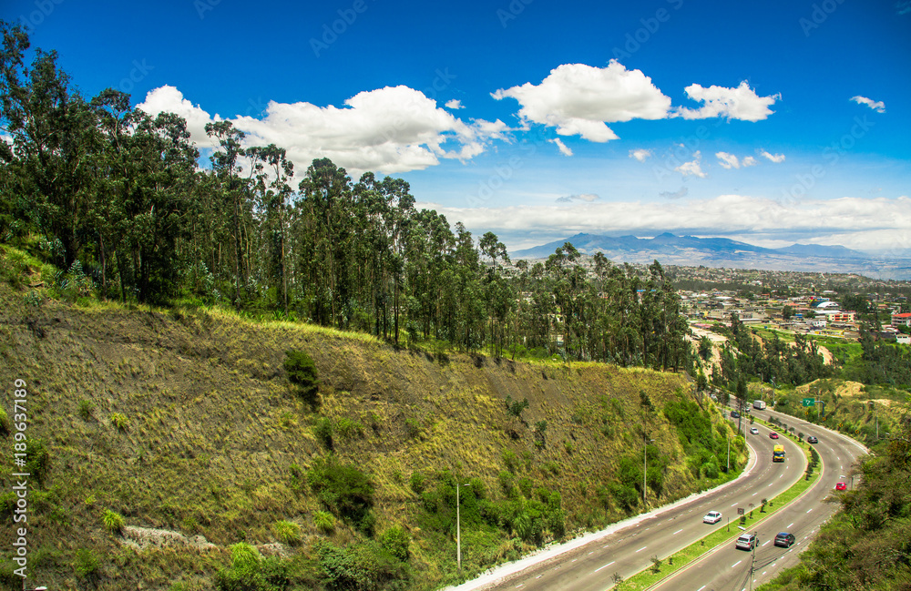 Aerial view of road in the mountains to visit the municipal dump in the city of Quito, Ecuador