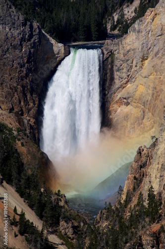 View of Lower Falls with rainbow, Yellowstone National Park, Wyoming.