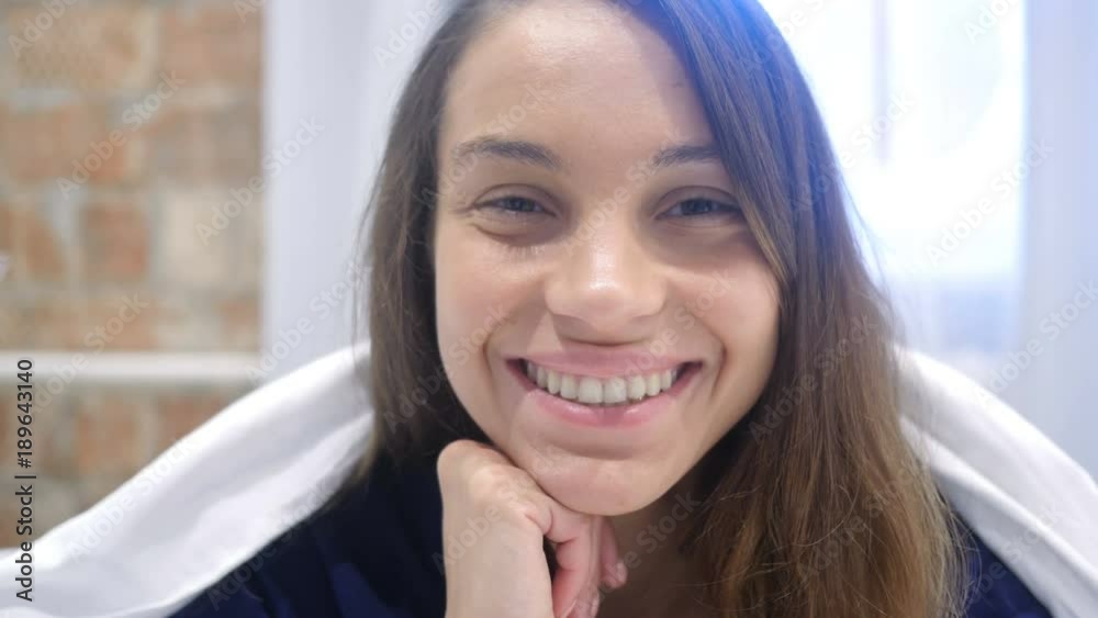 Close Up of Smiling Hispanic Woman Face Lying in Bed Close Up of Smiling Hispanic Woman Face Lying in Bed