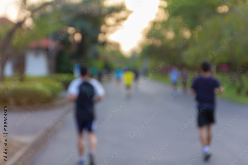 abstract blur focus people jogging in park abstract blur focus people jogging in park