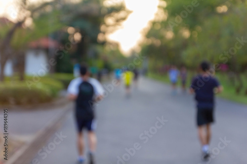 abstract blur focus people jogging in park © bankajk