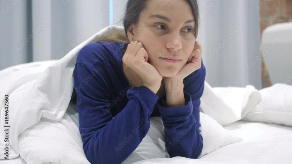 Thinking Hispanic Woman in Bed Day Dreaming, Brainstorming Thinking Hispanic Woman in Bed Day Dreaming, Brainstorming