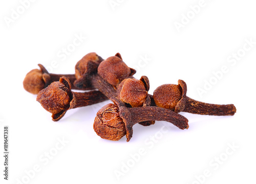 Macro closeup of a Organic black clove (Syzygium aromaticum) isolated on white background. photo