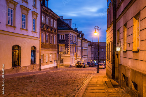 Mostowa street on the old town at night in Warsaw, Poland