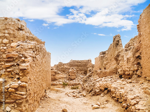 Ancient ruines of berbers town. Oasis Chebika, famous landmark in Sahara desert. Tunisia.